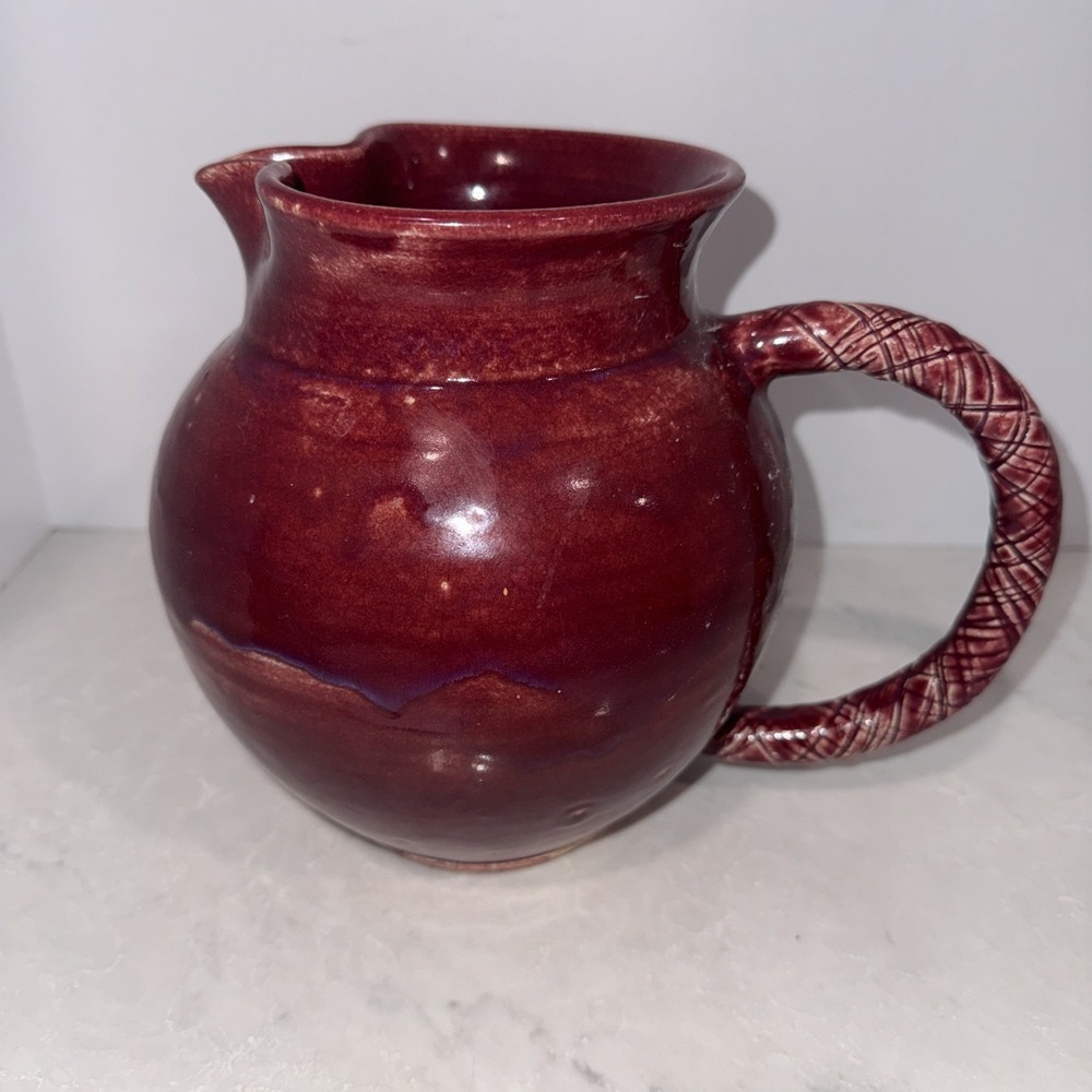 Red Ceramic Pitcher With Thatched Handed